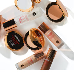 MCoBeauty Flawless Glow liquid highlighter on cheekbone