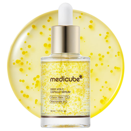 Medicube Deep Vitamin C Capsule Serum bottle close-up showing radiant hydration