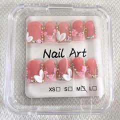 Meemooron 3D flower design with rhinestones on nails.