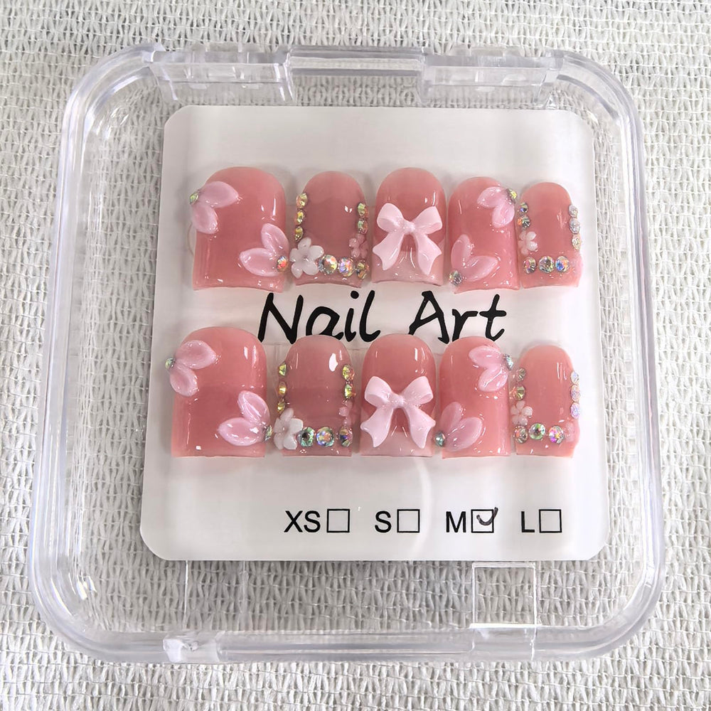 Meemooron glossy nails with luxury rhinestones boost at-home manicure.