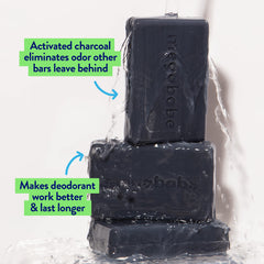 Megababe Space Bar close-up highlighting charcoal detox for deep cleansing.