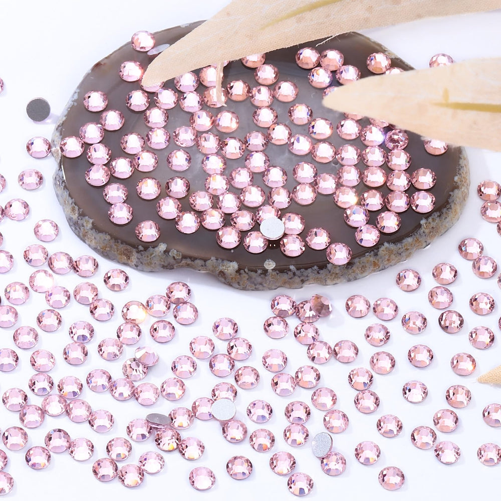 Meibite pink loose crystals for decor and craft embellishments.