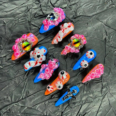 MellowBells Blood Style handmade nails closeup showing unique design for bold party looks