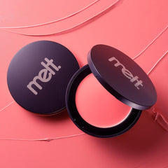 Melt Pink Sand Cream Blushlight lip tint for easy on-the-go color.
