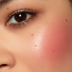 Melt Pink Sand Cream Blushlight packaging close-up highlighting compact design.