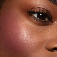 Melt Pink Sand Cream Blushlight soft pink glow on skin.