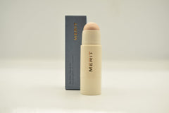 Merit Day Glow Dewy Highlighting Balm Cava packaging close-up highlighting vegan cruelty-free design