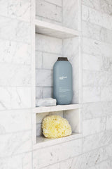 Method Men Juniper + Sage bottle on shelf, energizing scent for morning routine