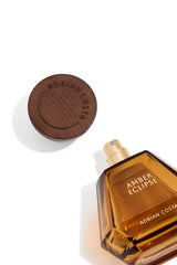 Michael Malul Adrian Costa Amber Eclipse bottle product shot reveals refined design and masculine silhouette.