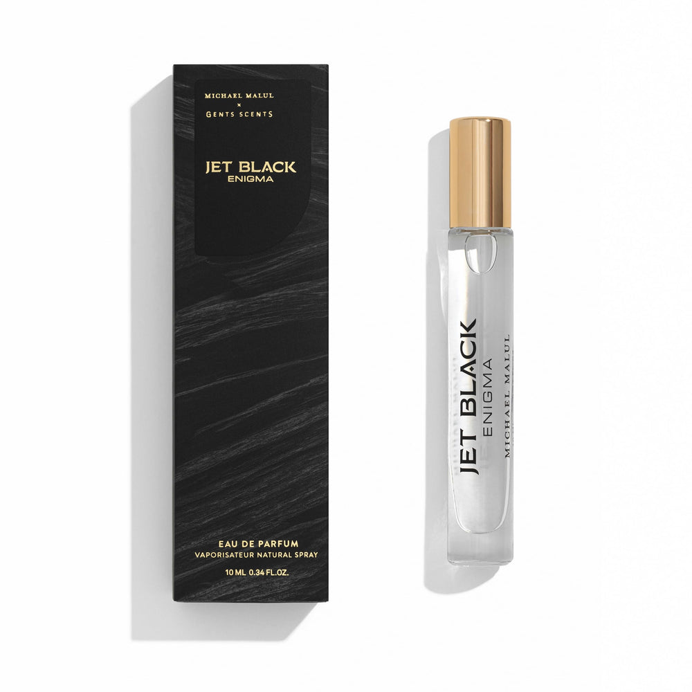 Michael Malul Jet Black Enigma bottle closeup, premium design for evening elegance.