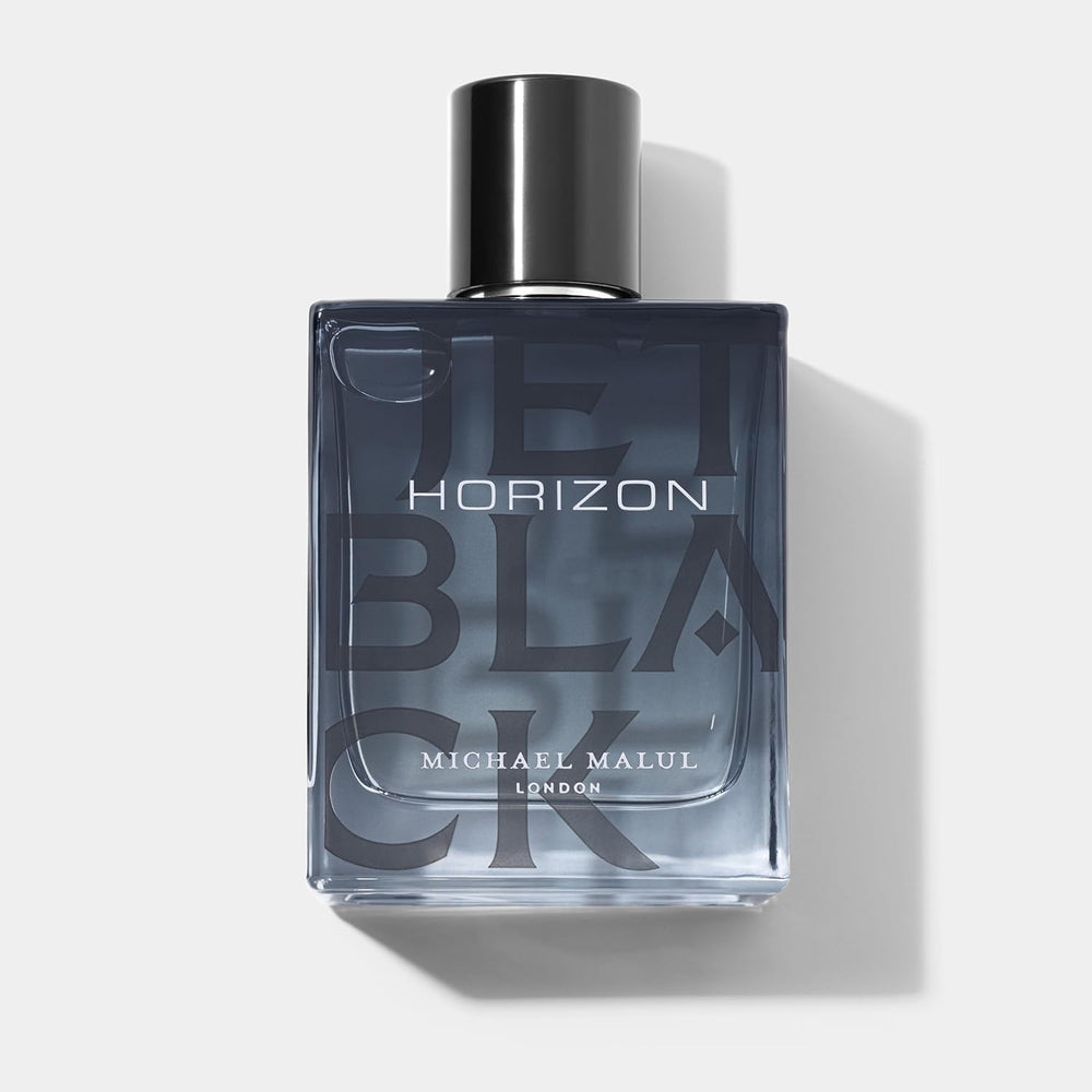 Michael Malul Jet Black Horizon bottle close-up showing sleek design.