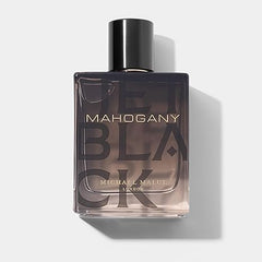 Michael Malul Jet Black Mahogany bottle, sleek focal point for refined daily scent.