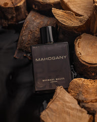Michael Malul Jet Black Mahogany close-up label highlights premium packaging.
