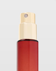 Michael Malul Lights Down Low packaging display, evokes mood-enhancing scent moments.
