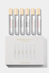 Michael Malul Women's Discovery Set travel-size fragrance bottles for on-the-go exploration.