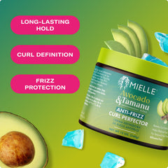 Applying Mielle Avocado & Tamanu on damp hair for curl definition.