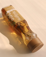 Milagros Rosemary Shampoo ginger slices highlighting nourishing botanical elements