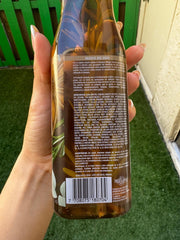 Milagros Rosemary Shampoo packaging on shelf conveying natural Colombian care