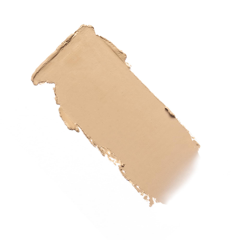 Milani Conceal + Perfect Blur Out Skin Tint on hand demonstrates buildable coverage.