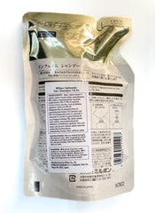 Milbon Inphenom shampoo texture close-up showing rich lather