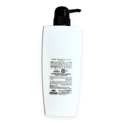 Milbon Repair Restorative Shampoo foaming lather indicating gentle cleansing.