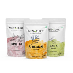 Minature amla powder jar for natural shine and nourishment.