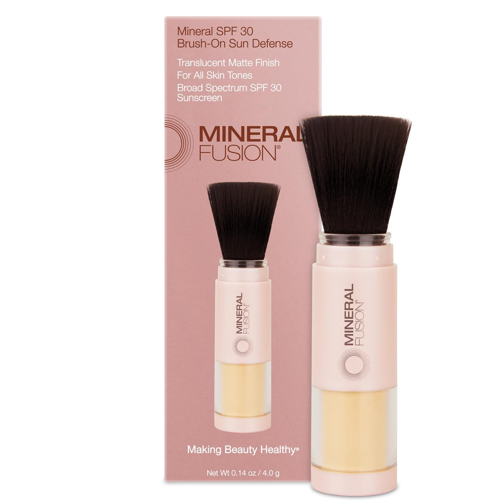 Mineral Fusion Brush-On Sun Defense SPF 30 applying for a shine-free, UV-protective finish.