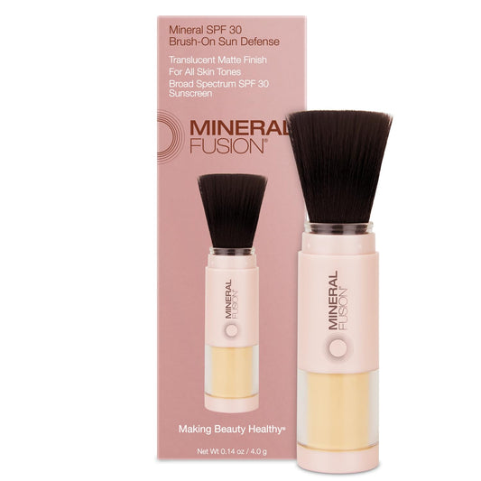 Mineral Fusion Brush-On Sun Defense SPF 30 applying for a shine-free, UV-protective finish.