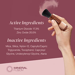 Mineral Fusion mineral sunscreen powder with built-in soft brush for easy, on-the-go application.