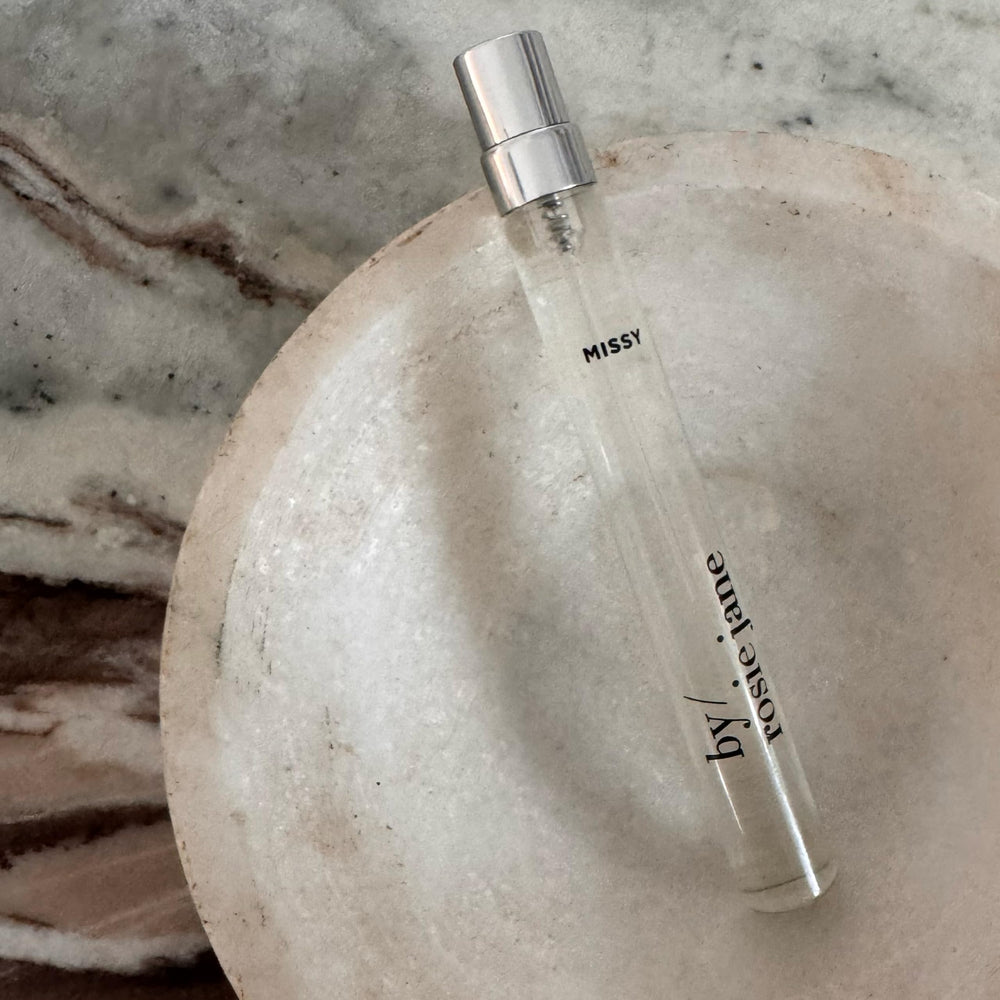 By Rosie Jane Missy tropical vibe scene suggesting vacation-ready fragrance