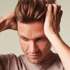 Cream texture close-up showing smooth, easy-to-apply formula
