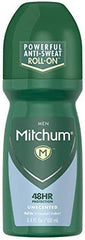 Applying Mitchum Invisible Unscented Roll-On underarm for all-day odor and wetness control.