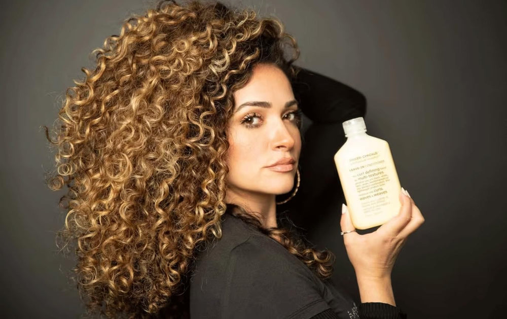 Mixed Chicks frizz-control shine image suggests manageable frizz and glow.