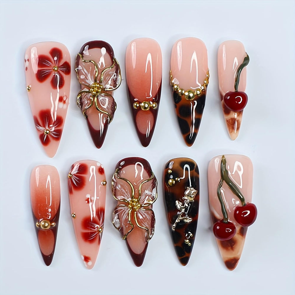 MIXFOSAHN leopard design nails with 3D gold flowers for chic style.