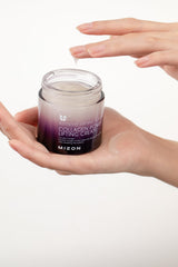 Ingredients panel of MIZON cream featuring royal jelly and hyaluronic acid