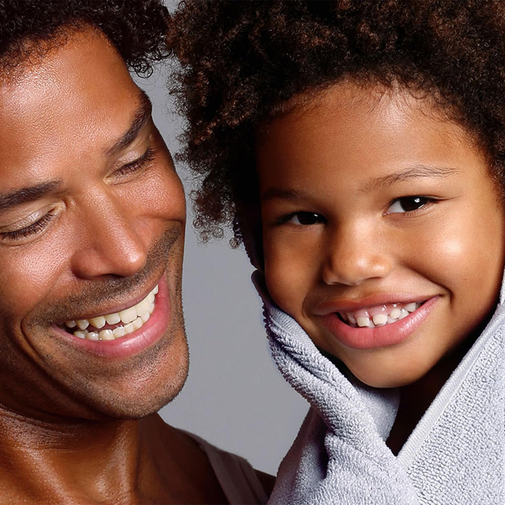 MONAT Junior Gentle Detangler used on kids' hair for smooth, manageable strands.