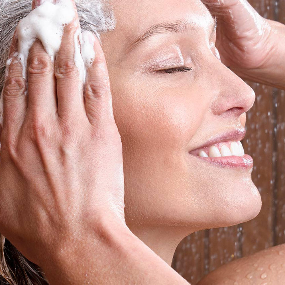 MONAT Scalp Purifying Scrub on shelf conveys premium care for daily routines.