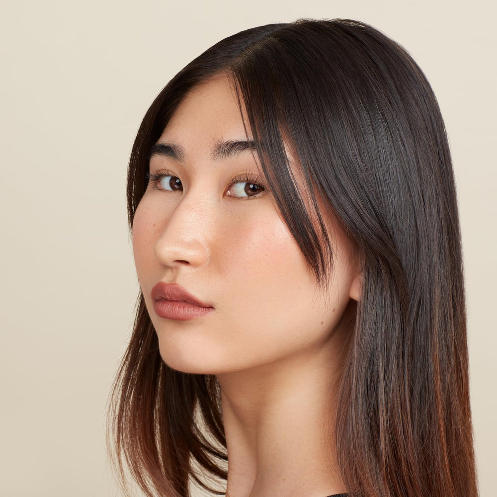 Close-up of Browny Nude shade on lips with smooth creamy line