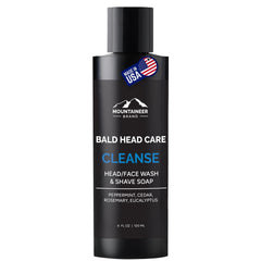 Mountaineer Brand Bald Head Wash bottle highlighting natural scent and clean formula.