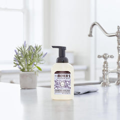 Mrs. Meyer's Clean Day foaming hand soap on sink with bottle and label visible