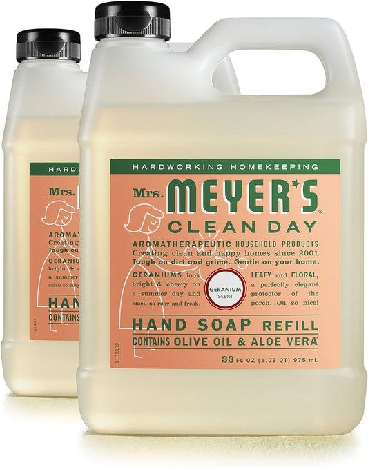 Mrs. Meyer's Clean Day Geranium hand soap refill 33 oz two-pack on a sink for fresh hands.