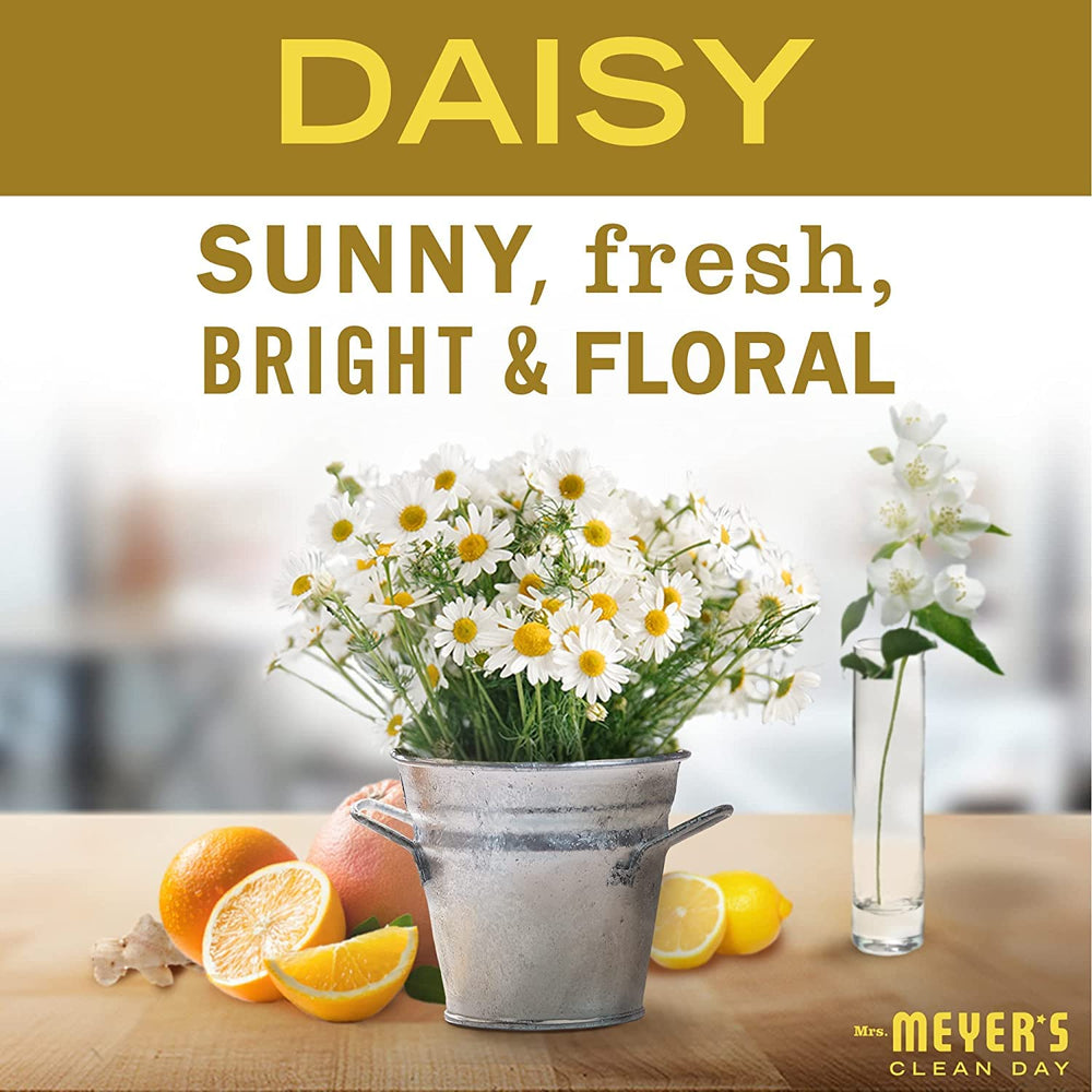 Mrs. Meyer's Daisy dish soap by the sink cutting grease effectively.