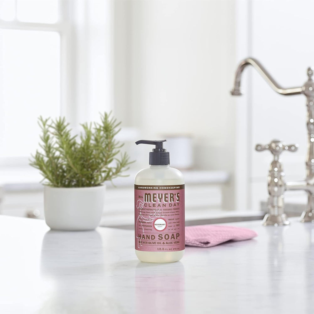 Mrs. Meyer's Rosemary hand soap six-pack displayed for kitchen or bathroom use.
