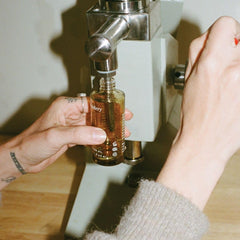 Silky texture of MST Monastery Rose cleansing oil on skin
