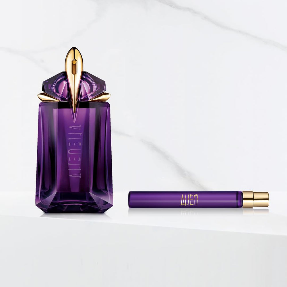 Mugler Alien cashmere-wood detail evokes warm depth for evening scents.