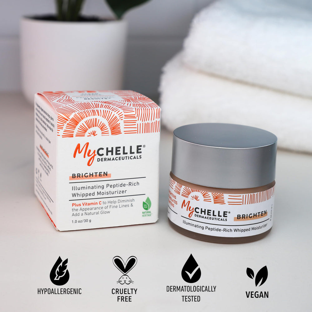 MyCHELLE Illuminating Peptide-Rich Whipped Moisturizer pump action showing easy application