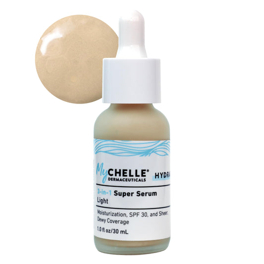 MyCHELLE Light Serum bottle demonstrates sheer tint with hydrating glow