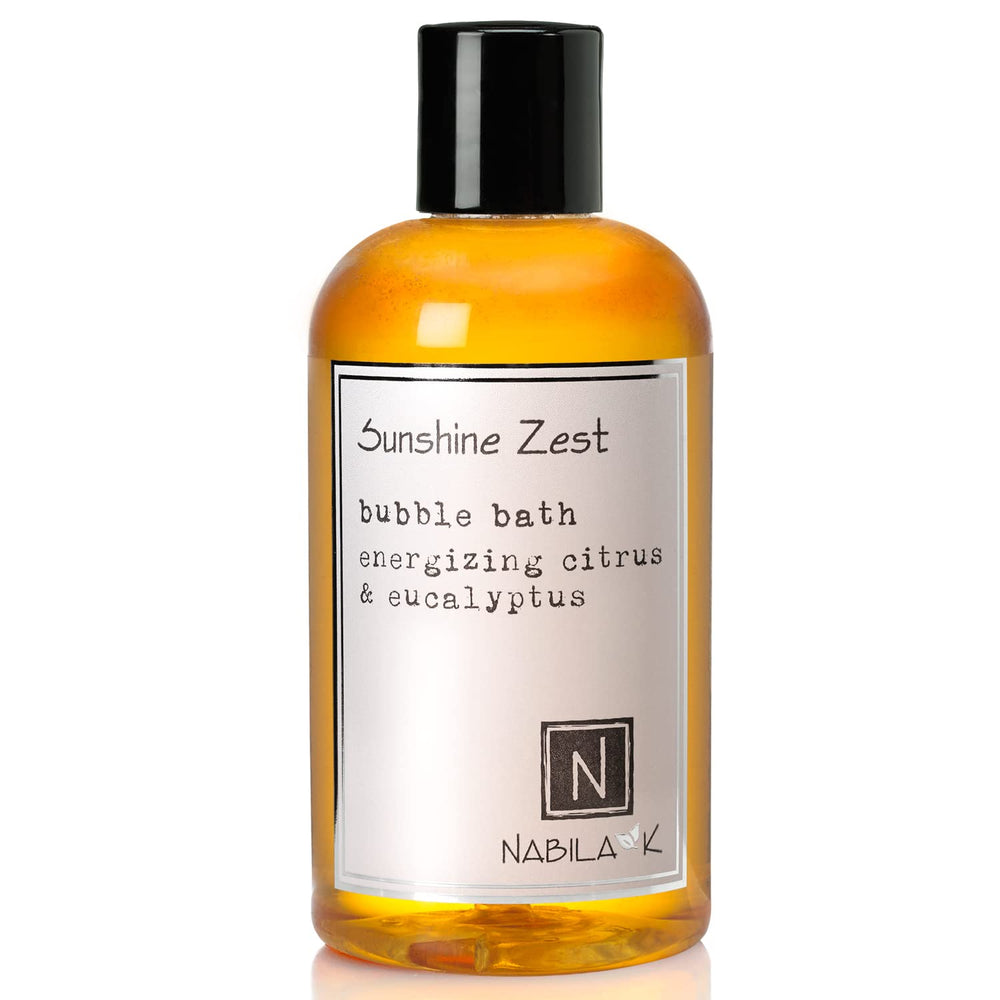 Nabila K Sunshine Zest bubble bath bottle pour for a refreshing, gentle cleanse.
