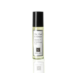 Nabila K Vim roll-on bottle displays premium vetiver fragrance in travel-size.