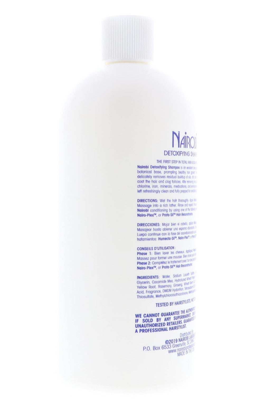 Nairobi Detoxifying Shampoo foamy lather on hands suggests thorough scalp cleansing.